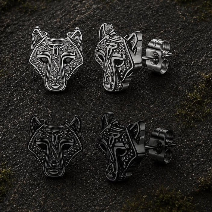 Viking wolf head stud earrings in black and silver finishes, featuring intricate Celtic knotwork.