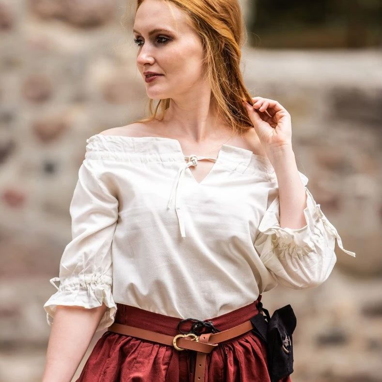 White off-shoulder peasant blouse with lace detailing, perfect for a Viking look.