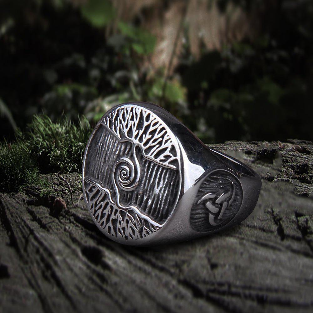 Viking Yggdrasil Tree of Life ring in polished silver-tone metal with Celtic knot details.