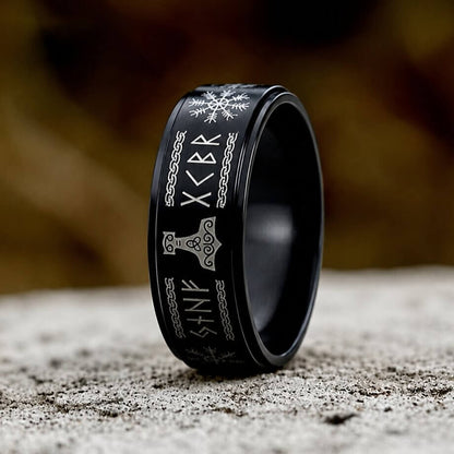 Black Viking spinner ring engraved with Vegvisir compass, Mjolnir hammer, and Norse runes
