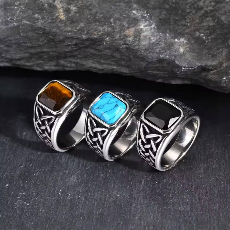 Viking Celtic knot stainless steel rings with brown, blue, and black stones.