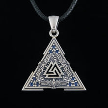 Sterling silver Viking Valknut pendant with blue gems on a black cord.
