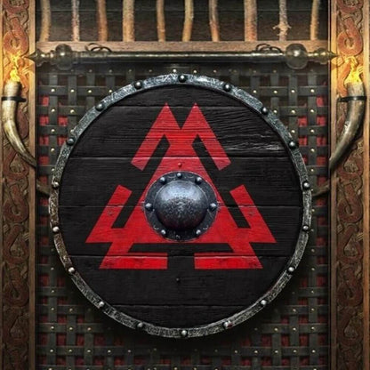 Valknut Shield of the Fallen Warrior featuring bold red Valknut symbol on black wood with a rugged metal boss and rim.