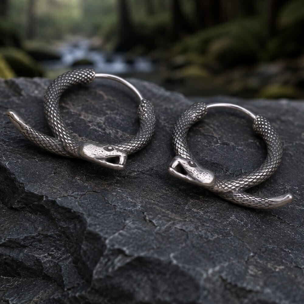 Antiqued silver Viking coiled serpent hoop earrings with scaled snake design and detailed heads