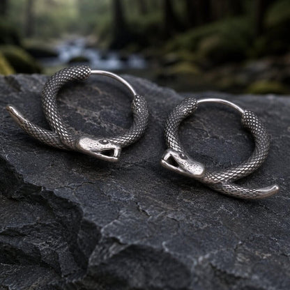 Antiqued silver Viking coiled serpent hoop earrings with scaled snake design and detailed heads