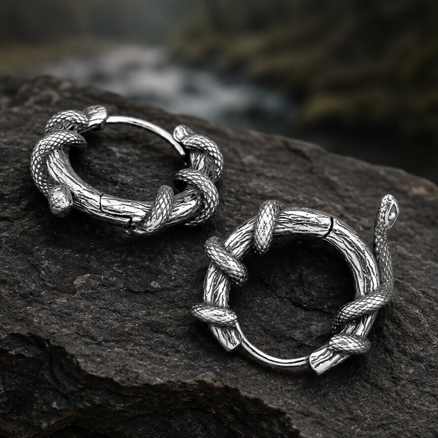 Silver Viking Jörmungandr hoop earrings with serpent coiled around branch in Norse mythology design