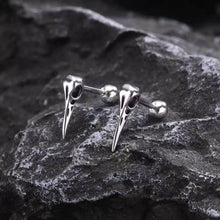 Silver Viking raven skull stud earrings with detailed beak and Odin's ravens design