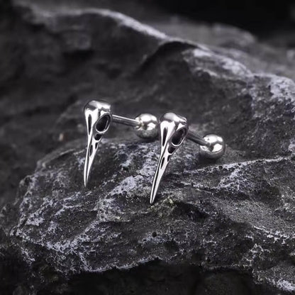 Silver Viking raven skull stud earrings with detailed beak and Odin's ravens design