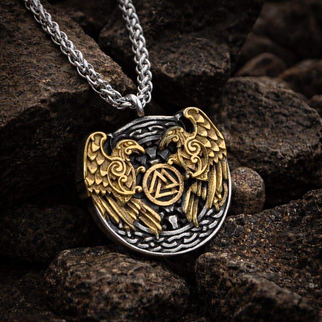 Viking Raven Valknut necklace: silver pendant with gold ravens and Valknut symbol on a chain.