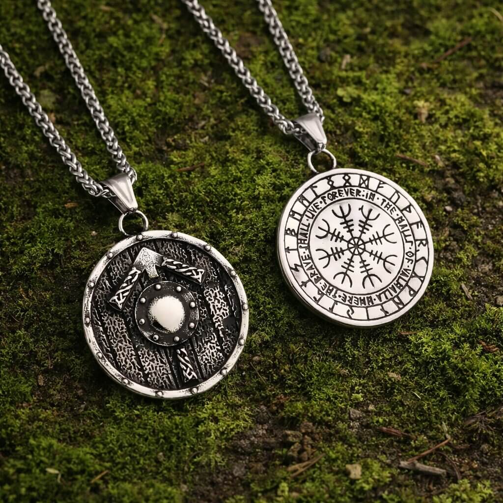 Viking Tyr Vegvisir Necklace with round silver pendants featuring shield and runic compass design on moss background
