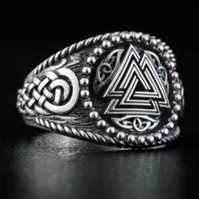 Viking silver ring with a Valknut Celtic knot design, rope edges, and beaded details.