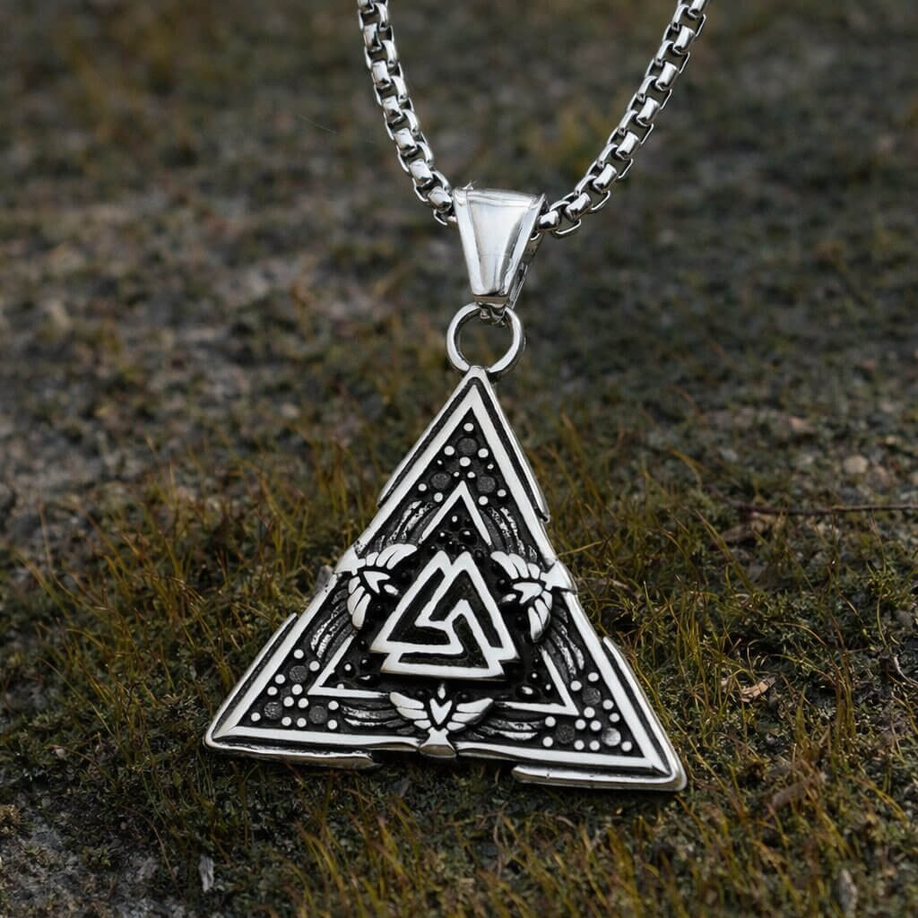 Viking Valknut pendant necklace in triangular frame featuring a central Valknut symbol, three ravens of Odin positioned at each corner with spread wings, with dotted border details, on a chain.