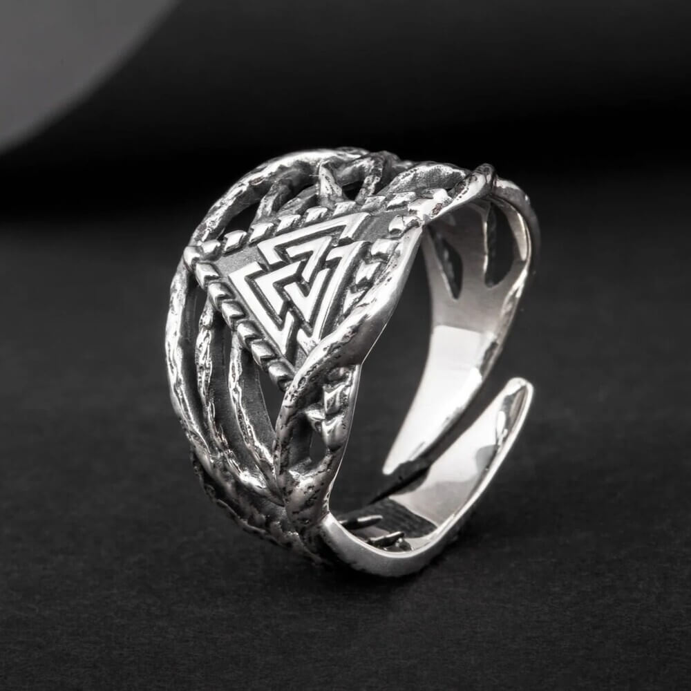 Viking silver Valknut raven claw ring with intricate knotwork, adjustable.