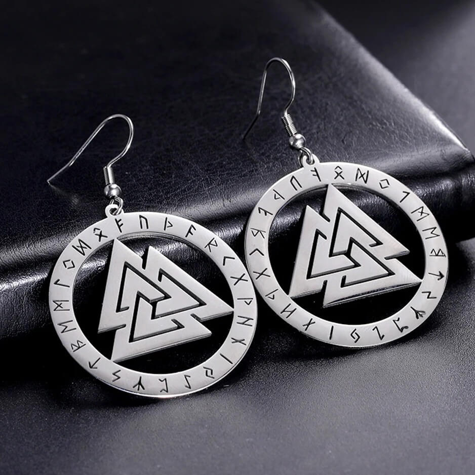 Pair of Viking Valknut Rune Circle Stainless Steel Earrings featuring interlocking triangle symbol surrounded by Elder Futhark rune alphabet on black leather