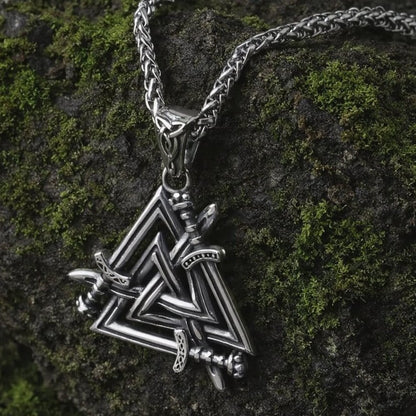 Viking Valknut sword necklace: silver-toned stainless steel pendant with three intertwined swords on a chain.